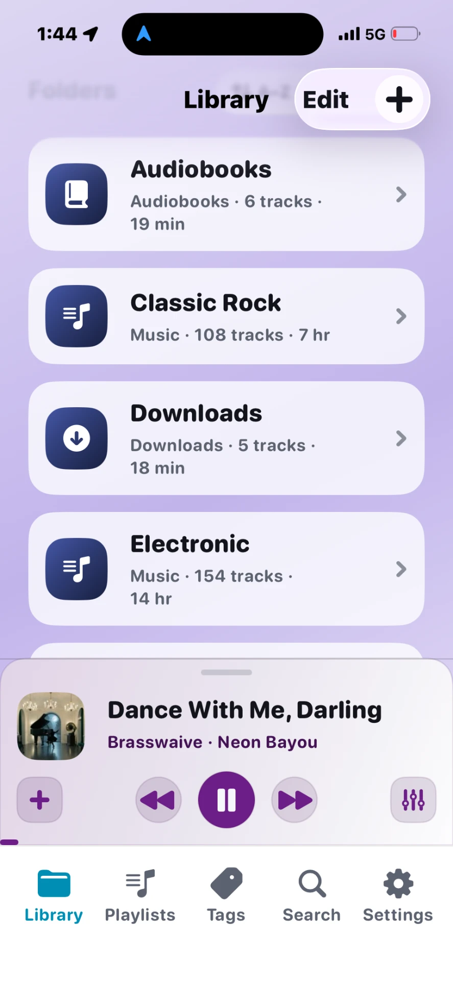 Stow Library home showing folders, pinned collections, and the mini player